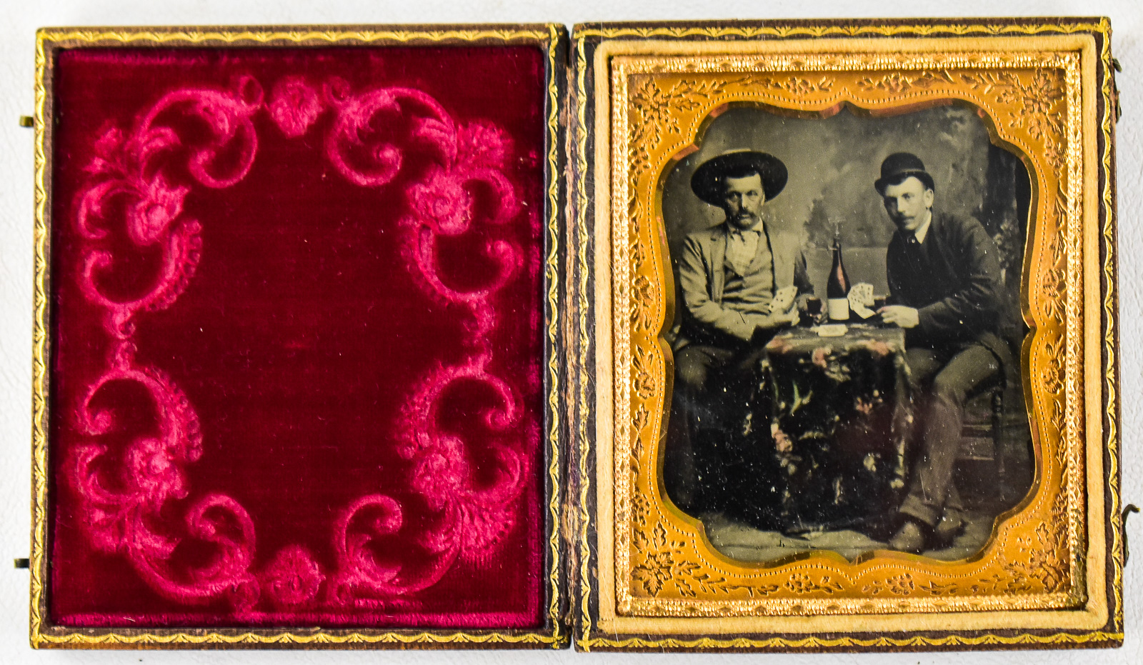 CASED TINTYPE OF MEN PLAYING CARDS