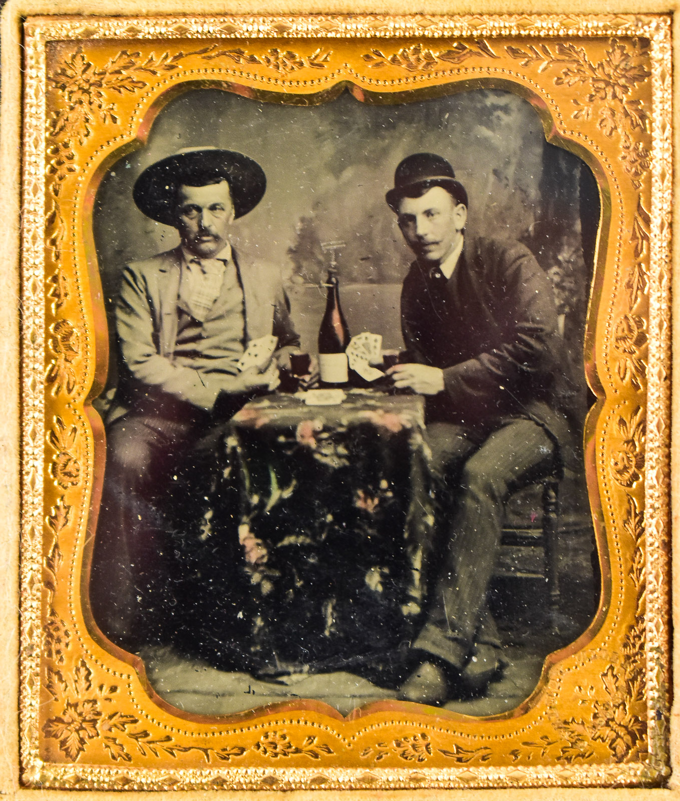 CASED TINTYPE OF MEN PLAYING CARDS