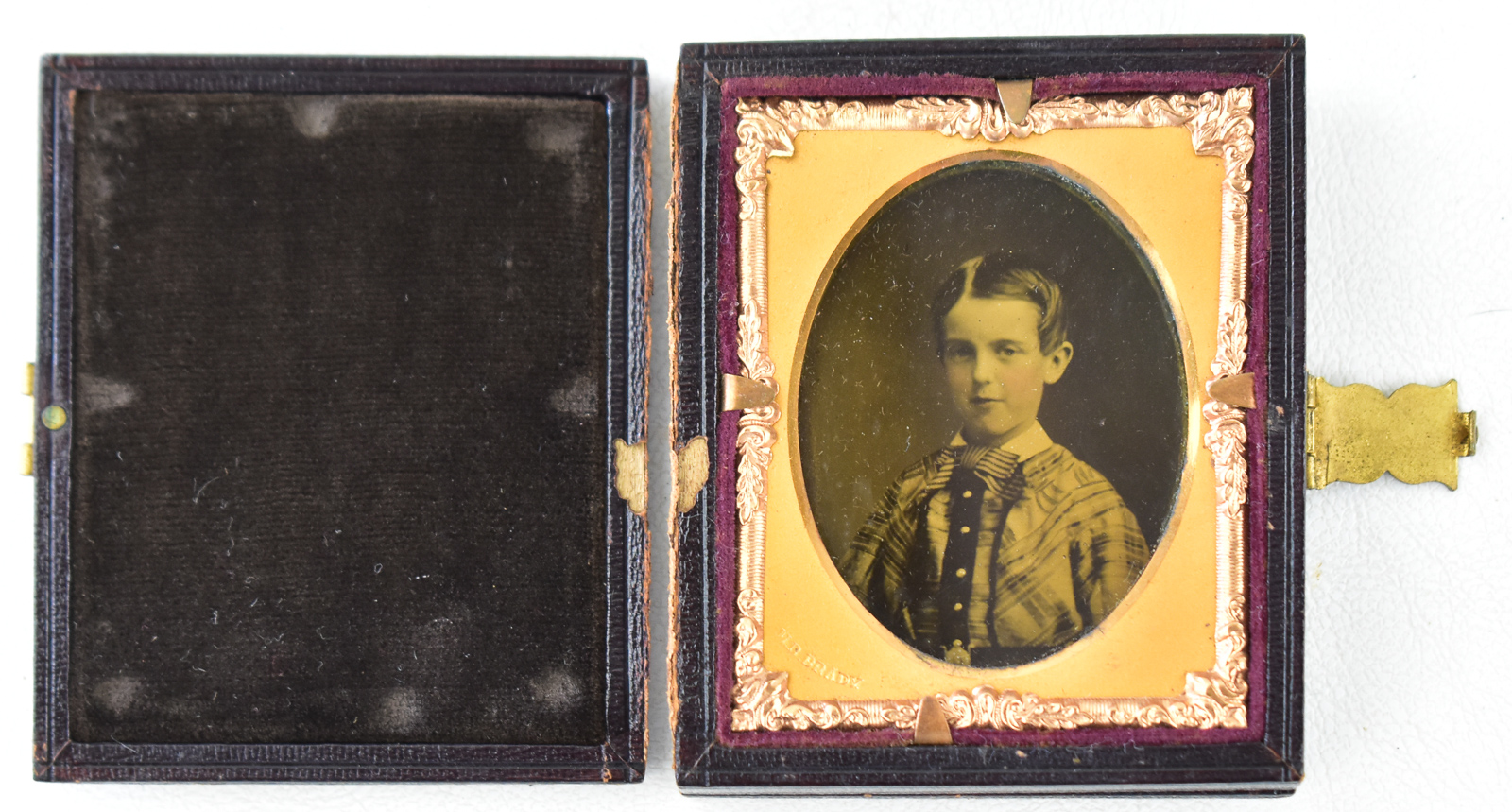 DOUBLE-SIDED CASED AMBROTYPE PHOTOGRAPH, CIRCA 1850s