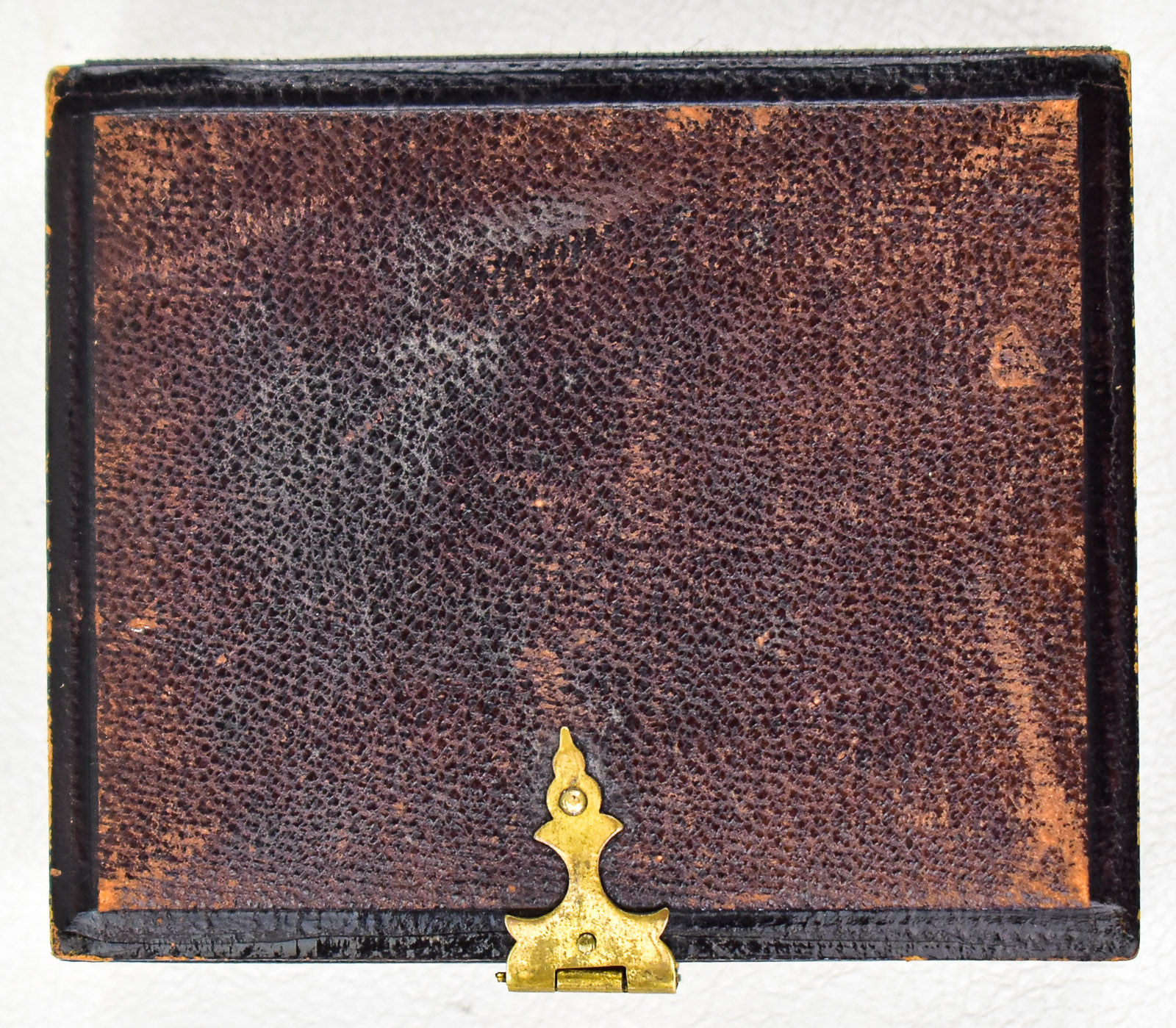 DOUBLE-SIDED CASED AMBROTYPE PHOTOGRAPH, CIRCA 1850s