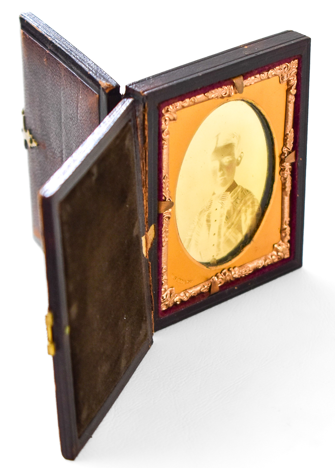 DOUBLE-SIDED CASED AMBROTYPE PHOTOGRAPH, CIRCA 1850s