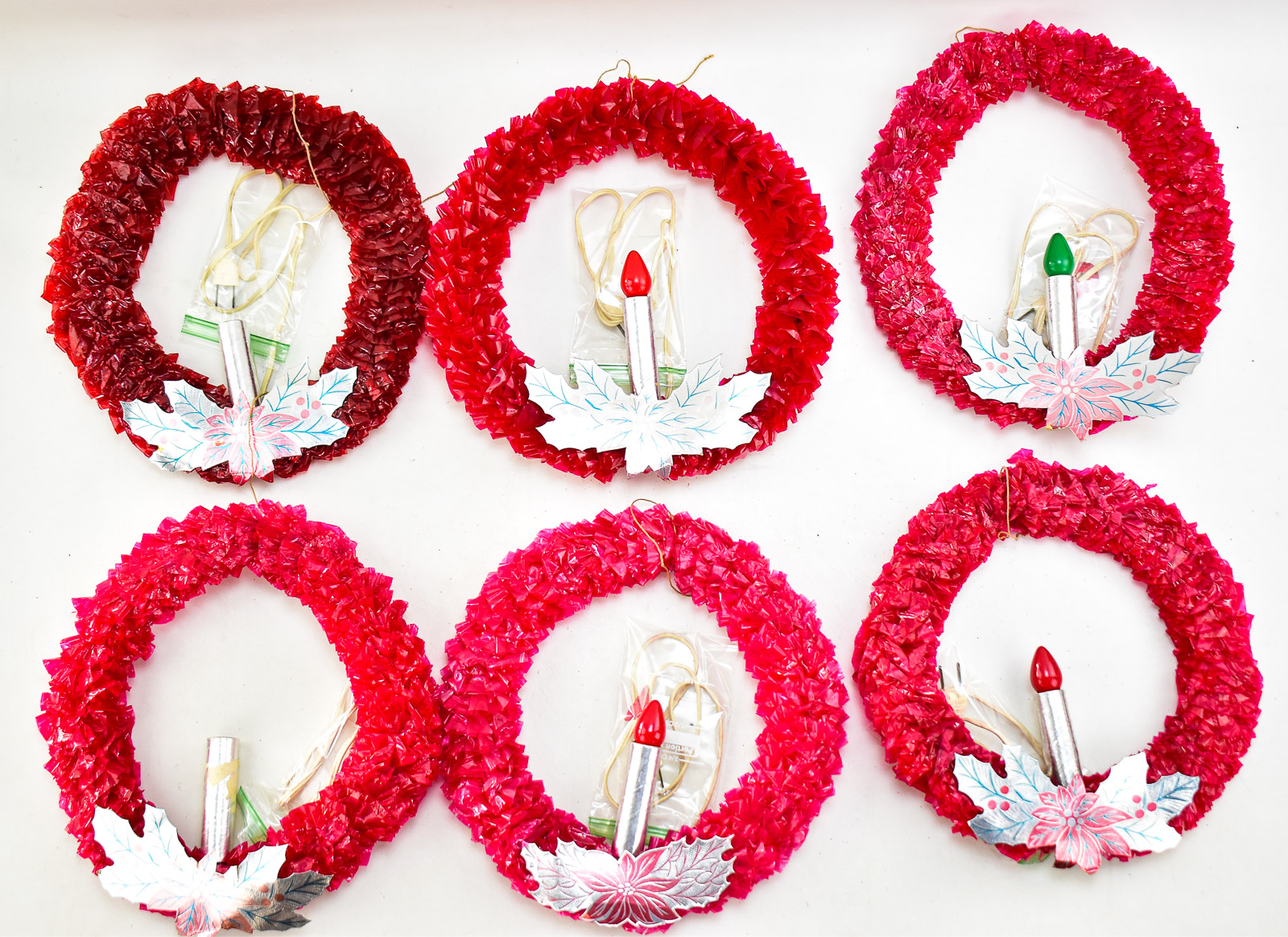 HALF DOZEN RED CELLOPHANE CHRISTMAS WREATHS