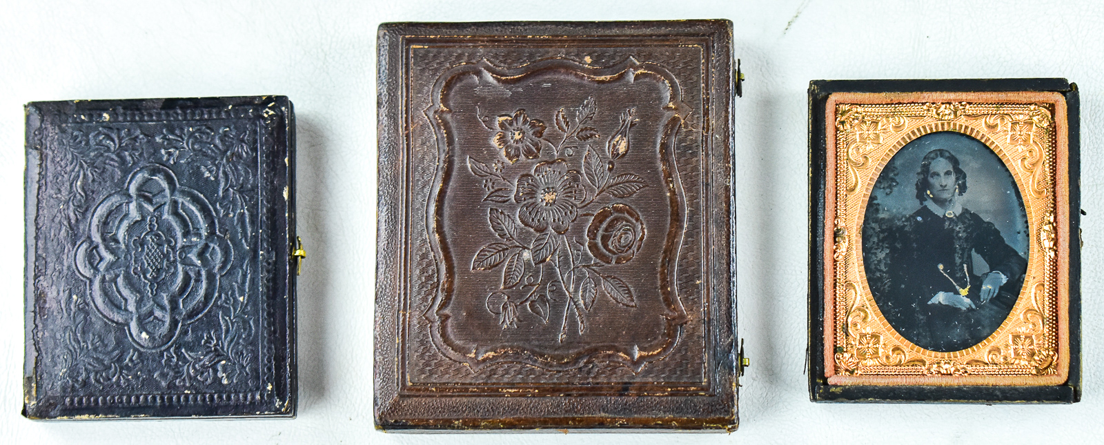 TRIO OF AMBROTYPES DEPICTING WOMAN