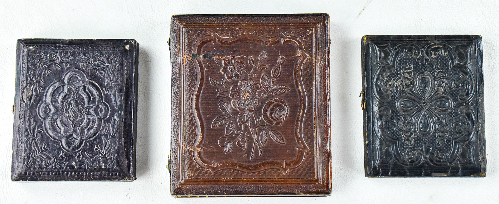 TRIO OF AMBROTYPES DEPICTING WOMAN
