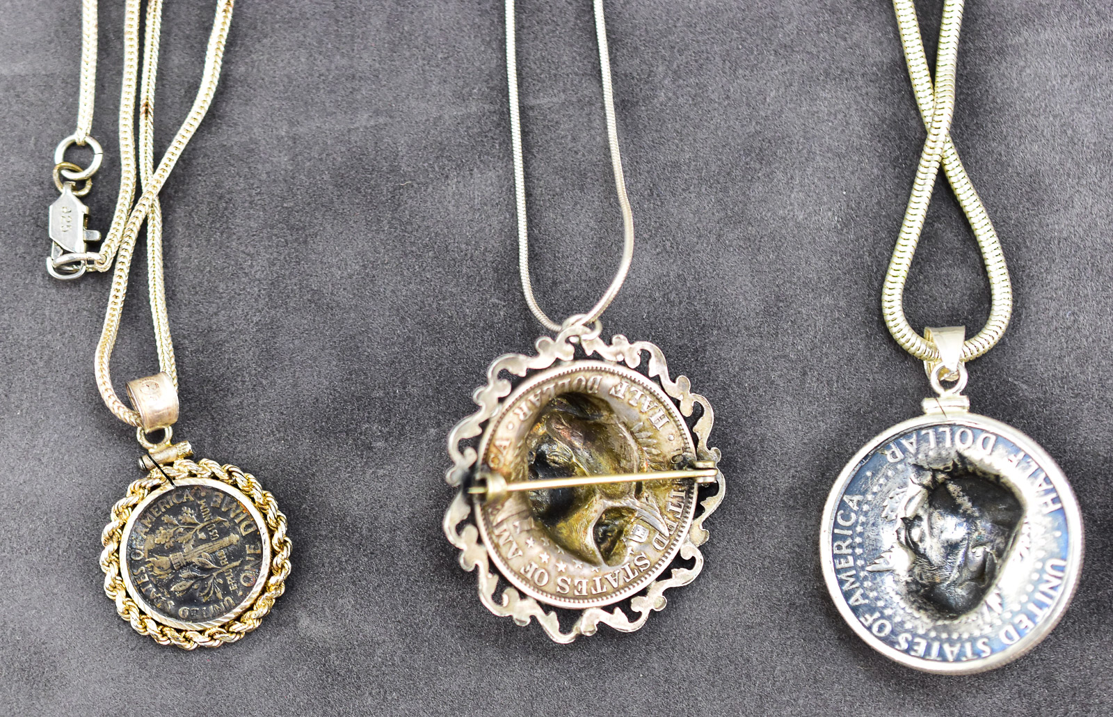 TRIO OF COIN PENDANT NECKLACES; STERLING SILVER