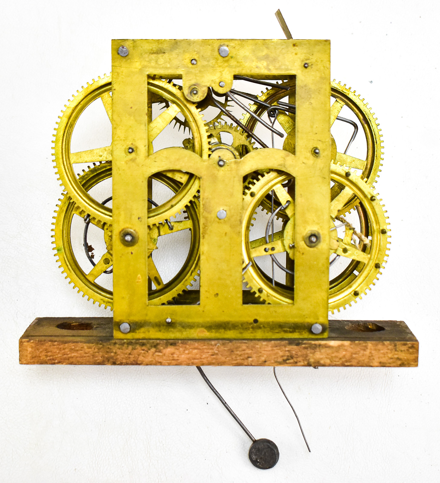 FIVE BRASS CLOCK MOVEMENTS