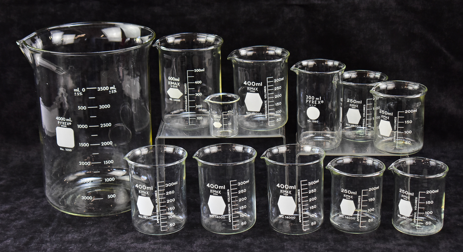 ELEVEN LABORATORY BEAKERS