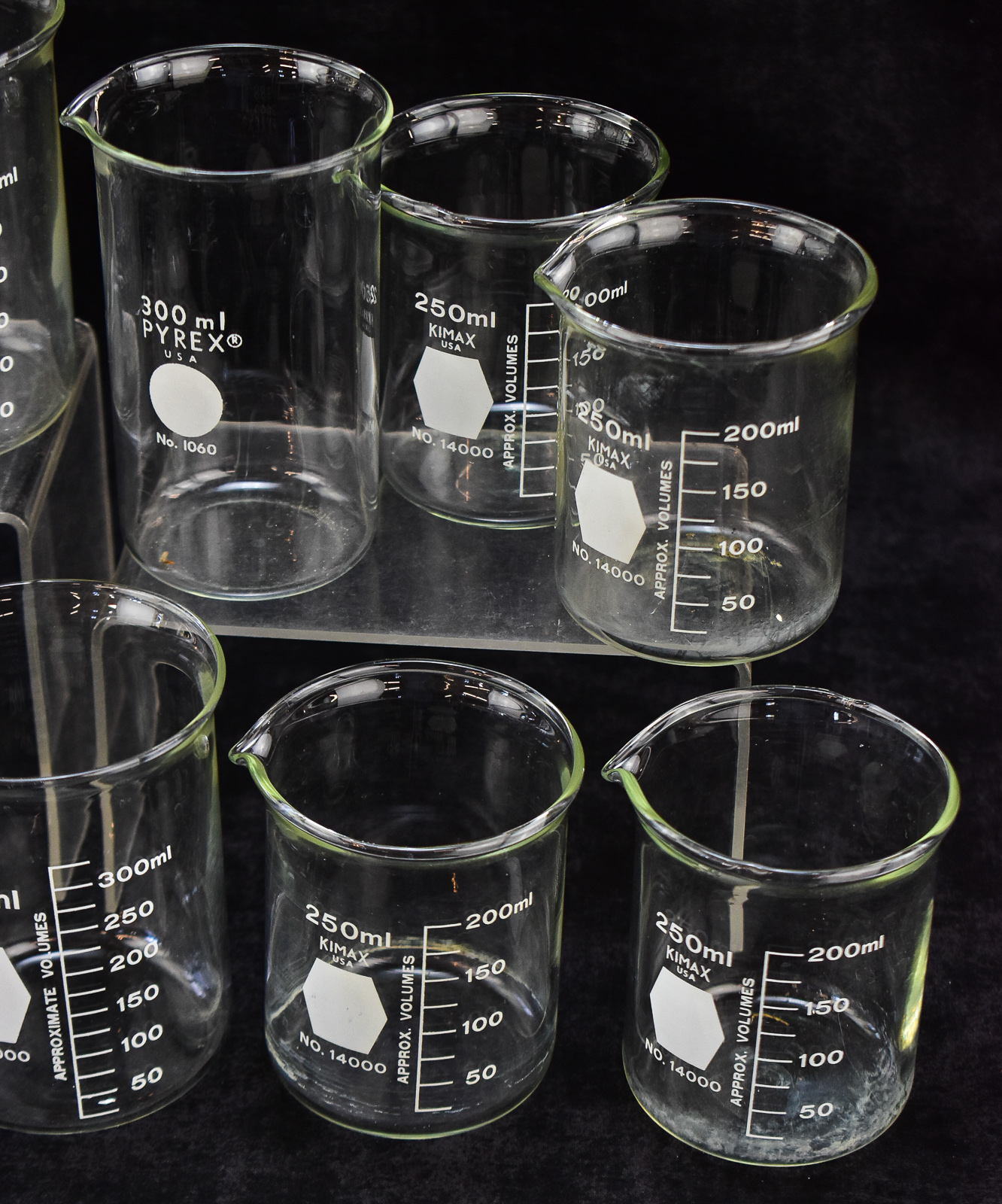 ELEVEN LABORATORY BEAKERS