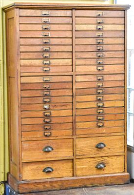 OAK MULTI-DRAWER LETTER CABINET. An oak multi-drawer letter cabinet, early 20th century. The 