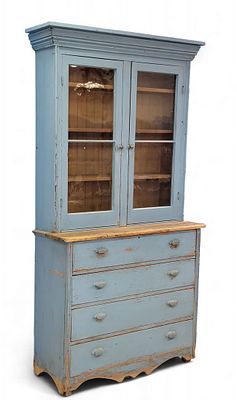 BLUE-PAINTED STEP-BACK CUPBOARD. Midwestern (found in Wisconsin), late 19th century, pine. 