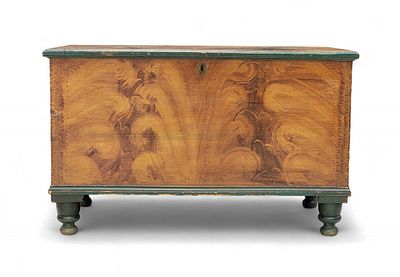 DECORATED BLANKET CHEST. Mid-19th century, pine and poplar. Dovetailed box with turned feet, and 