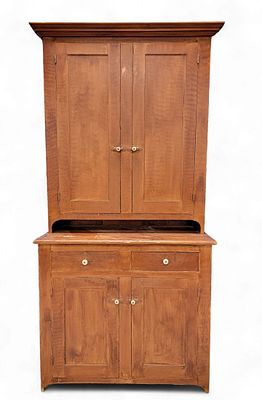 DECORATED STEP-BACK CUPBOARD. Midwestern (found in Wisconsin), mid-19th century, poplar. 