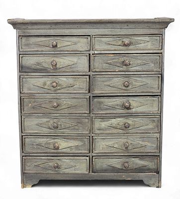 DIMINUTIVE MIDWESTERN CASE OF DRAWERS. Midwestern, 19th century, poplar and pine. A wall storage 