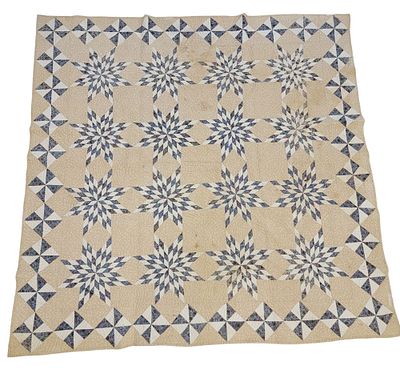 BETHLEHEM STAR AND PINWHEEL QUILT. American, 19th century, cotton. A Bethlehem Star quilt with 