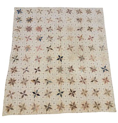 EIGHT-POINTED STAR PATCHWORK QUILT. American, 19th century, cotton. A patchwork quilt with 