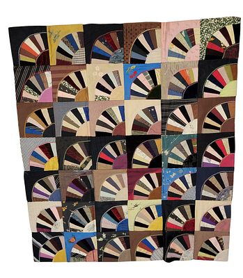 DATED FAN QUILT TOP. Possibly Nebraska, 1898-99, mixed fabrics. A fan quilt top composed of 