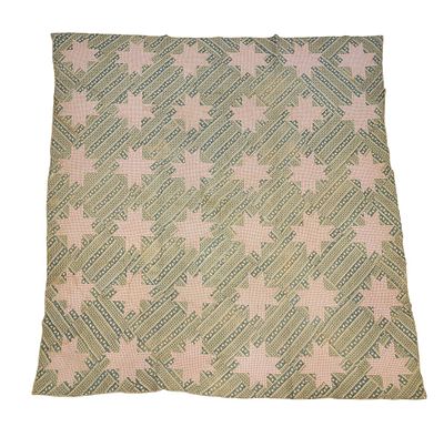 PATCHWORK OHIO STAR QUILT. American, 19th century, cotton. A patchwork quilt with pink printed 