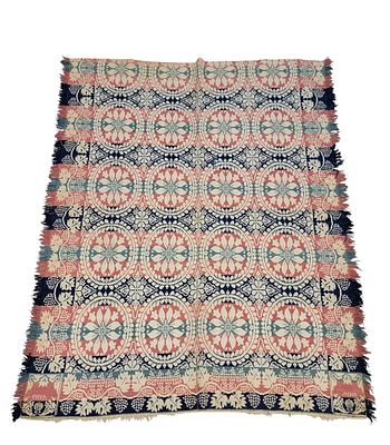 OHIO JACQUARD COVERLET. Ohio, mid-19th century. A jacquard coverlet in green, red, indigo, and 