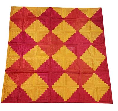 SILK LOG CABIN QUILT TOP. American, late 19th-early 20th century, silk. A log cabin lap quilt 