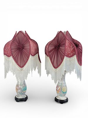 PAIR OF ELECTRIC LAMPS WITH MARBLE COLUMNS. 20th century, mixed media. A pair of electric lamps 