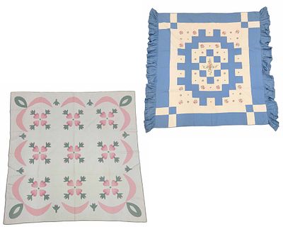 TWO FLORAL QUILTS. American, 1920-1940, cotton. Includes a floral and heart applique with swag 