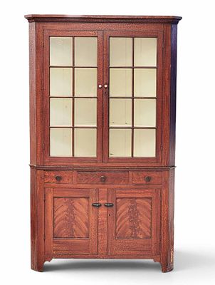 DECORATED CORNER CUPBOARD. Pennsylvania, 1820-1840, pine and poplar. Two-piece cupboard, the 