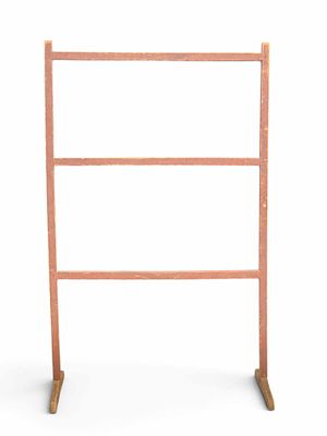 PAINTED QUILT OR DRYING RACK. American, mid-19th century, pine. Shoe feet and original red 