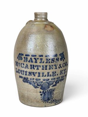 DECORATED KENTUCKY STONEWARE JUG. Southwestern Pennsylvania, c. 1875, retailed by Bayless 