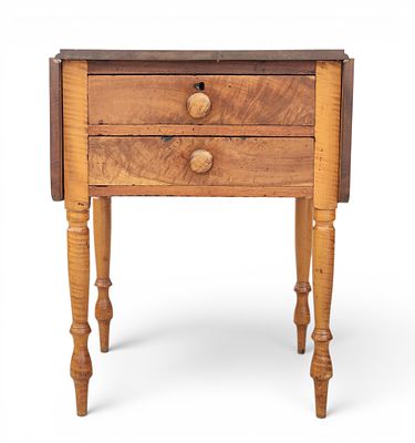 TWO-DRAWER DROP-LEAF STAND. Ohio or Pennsylvania, mid-19th century, curly maple and poplar. 