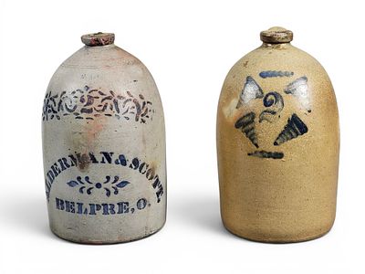 TWO OHIO STONEWARE JUGS. Includes a Muskingum County two-gallon jug with cobalt tornadoes, 14" 