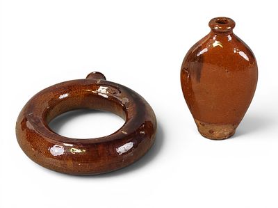 TWO REDWARE FLASKS. American, 19th century. Includes a ring flask, 9.5" high; together with a 