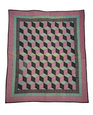 AMISH CRIB QUILT. American, mid-20th century. Tumbling blocks in purple, green, and black. 46" 