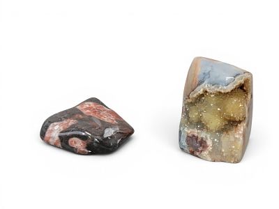 TWO POLISHED FLINT RIDGE FLINT SPECIMENS. One with vein of quartz crystals, 2.5" by 2.5" by 2". 