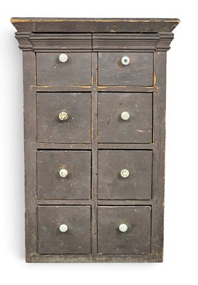 EARLY AMERICAN SPICE CABINET. Mid-19th century, pine. With eight drawers, the uppermost being 