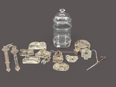 COLLECTION OF METALWARE AND GLASS CANISTER. American, 19th century. Includes a pair of strap 