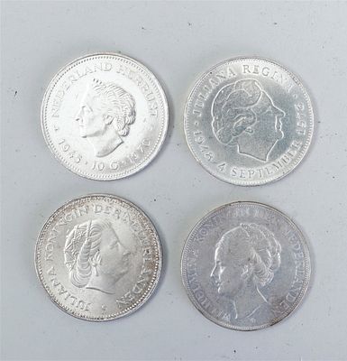 Collection of three Dutch rijksdaalders with the years 1931, 1970, and 1973. These coins were 