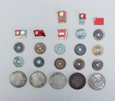 Collection of various Chinese coins with a few pins.