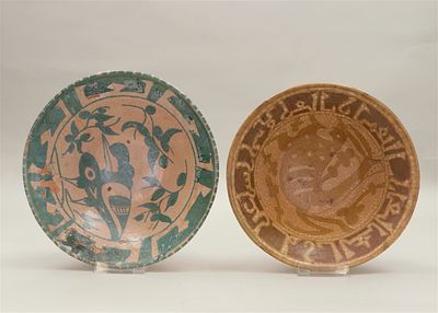 Lot of two Persian earthenware bowls, decorated with, among other things, animals and floral 