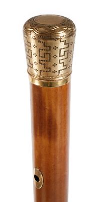 Spazierstock19. Jh., vergoldeter Metallknauf, ornamental ziseliert auf guillochiertem Grund