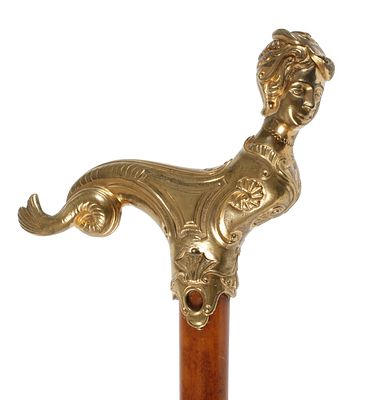 Figürlicher Spazierstockum 1880, Messing, teils fein ziseliert, geschwungenes Griffstück in