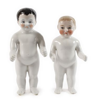 Zwei Badepuppensogenannte Nacktfrösche (Frozen Charlie), wohl 1920/30er Jahre, die größere mit