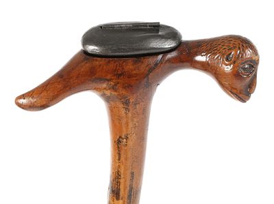 Spazierstock19. Jh., aus einem Wurzelstock geschnitzte Gehhilfe mit figürlich gestaltetem 