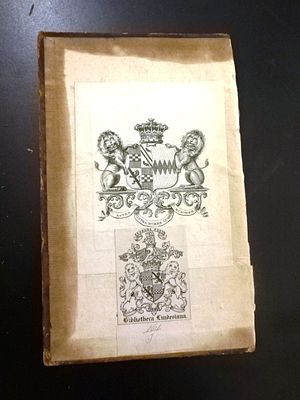 18th C Book Board Bookplates. An 18th century leather book board with two 18th century 