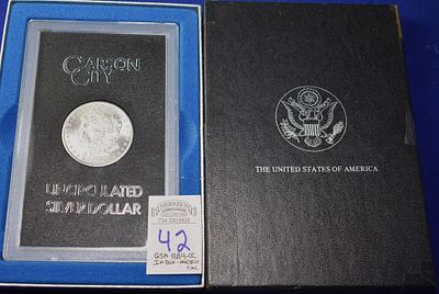 1884-CC GSA Boxed Morgan Silver Dollar. No GSA Certificate was inside this box when removed 