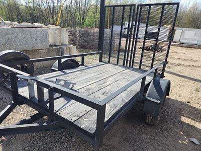 Motorcycle Trailer. New tires and rims, New wheel bearings, new lights, with a drop down split 