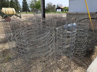 Welded wire fencing random lengths. This lot of welded wire fencing includes 12 plus rolls in 