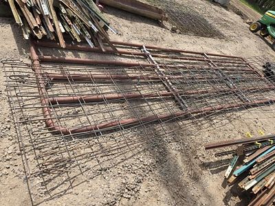 12' can't sag gate & cow panels. This lot includes a 12' Can’t Sag gate and 2 cow panels. A 