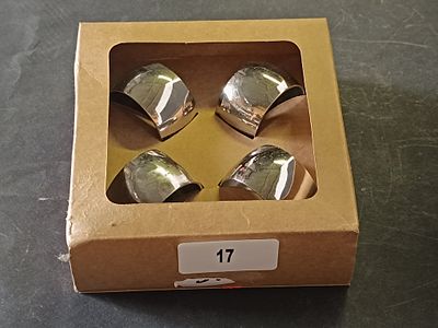 SET OF 4 SILVER TONE NAPKIN RINGS