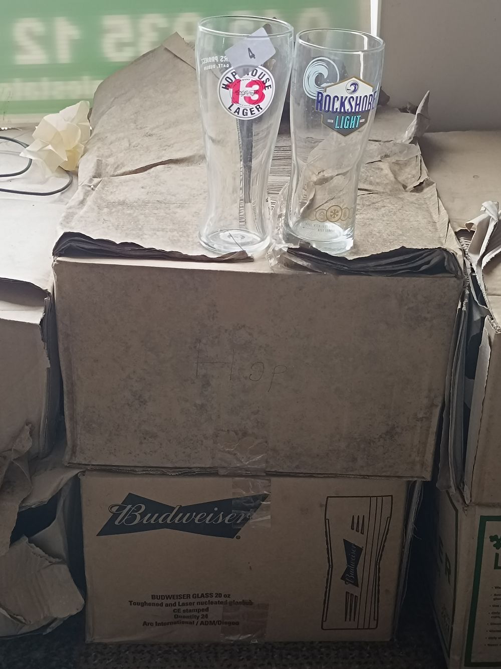 A 2 Boxes of Hop House and Rockshore Pint Glasses