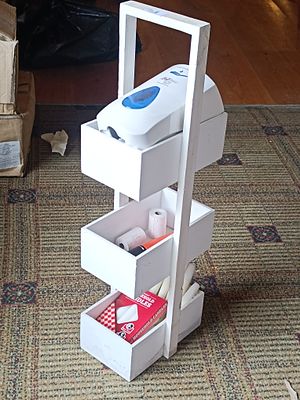 A Contemporary White-Painted Three-Tier Storage Caddy